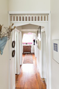 In order to insert a cavity slider in the hall for warmth and noise reduction, we faked a repeat of the colonial overhead detail and our new door could slide across.